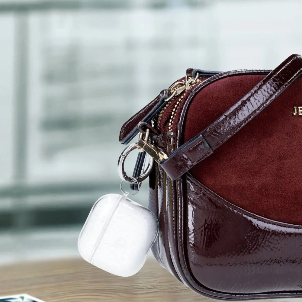 Hurtownia GSM - Elastyczne etui z karabińczykiem Bizon Case Headphone Clear do Apple AirPods 4 przezroczysto-brokatowe - BIZ8024 - {ean13} - Hurt
