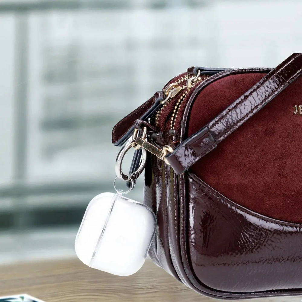 Hurtownia GSM - Elastický obal s karabinou Bizon Case Headphone Clear pro Apple AirPods 4 průhledný - BIZ8028 - {ean13} - Hurt